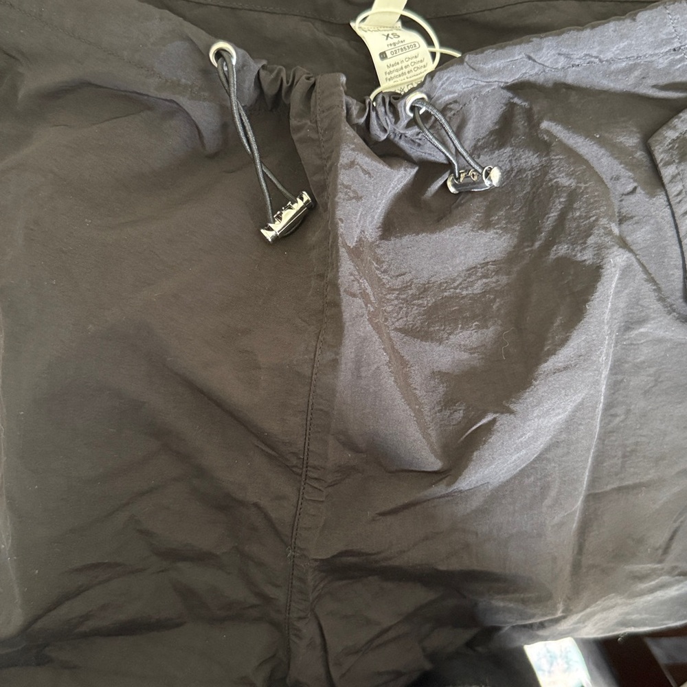 HALARA Black Parachute Pants with Snap Pockets and Pull Strings. - Picture 6 of 6